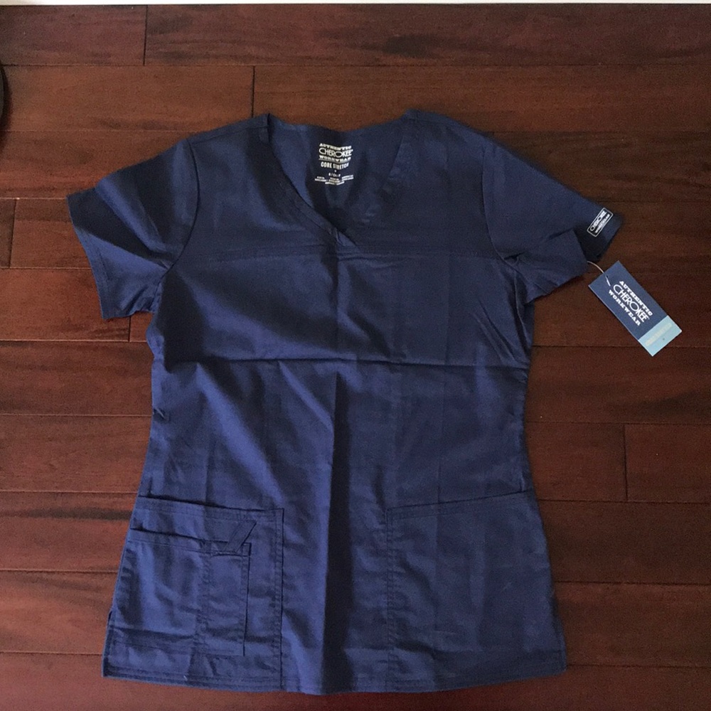 New with tags. Navy scrub top